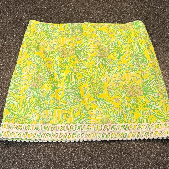 Lilly Pulitzer Dresses & Skirts - Lilly Pulitzer Yellow and Green Mini Skirt with Lace Trim - size 12